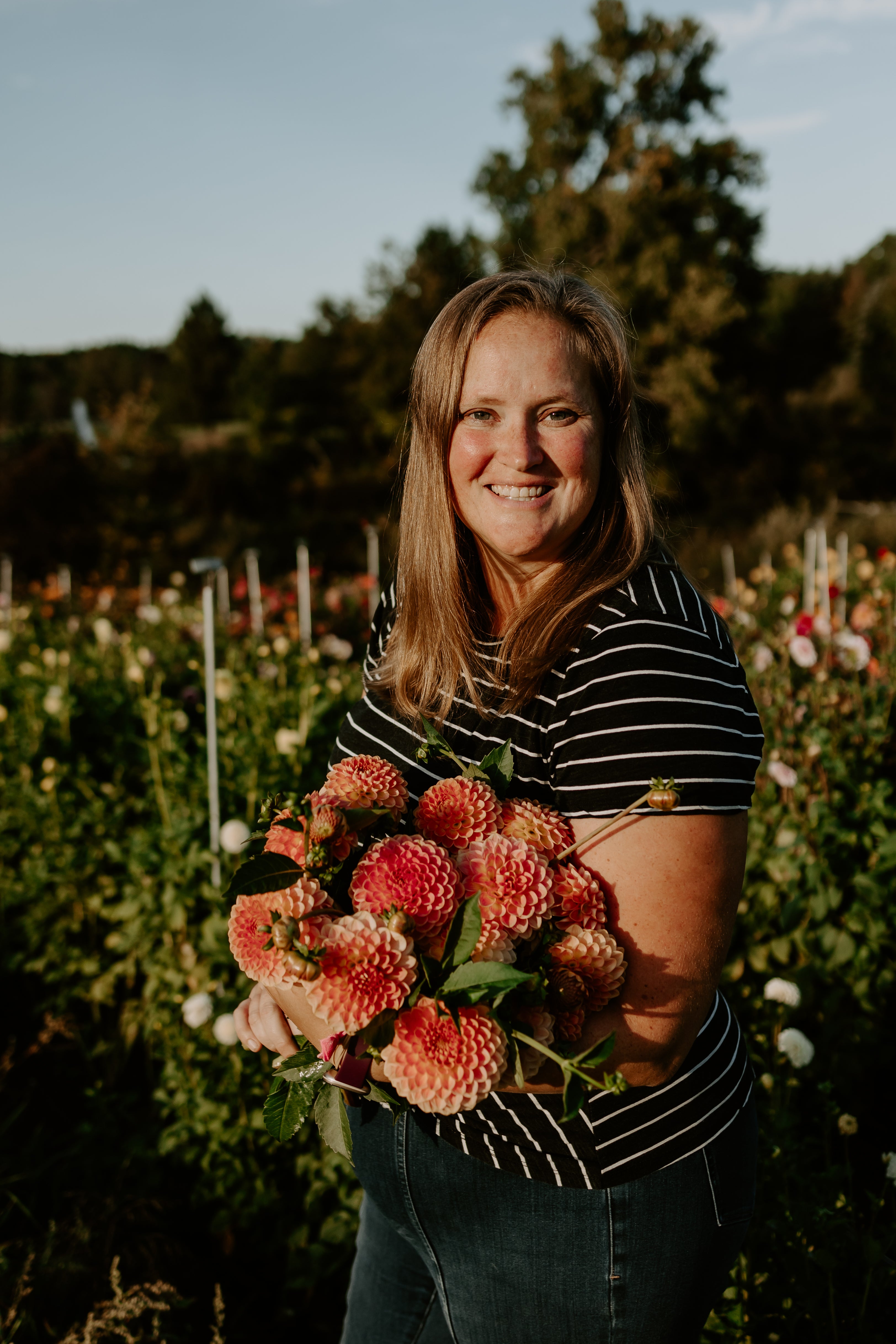 Birddog Flower Farm owner Meredith, in front of one of the dahlia fields